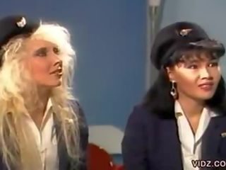 Three sensational flight stewardess in one scene