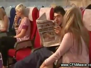 Plane babes raise trays for smashing handjob with lucky guy